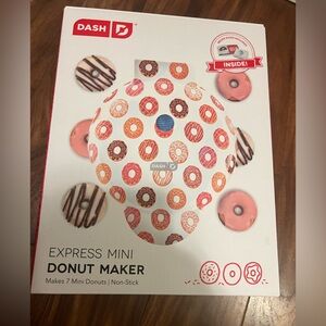 Never used, in box. Dash Express Mini donut maker.